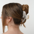 17's Haircare Vanilla Pearl Claw Clip used for elegant hair styling with a secure comfortable hold