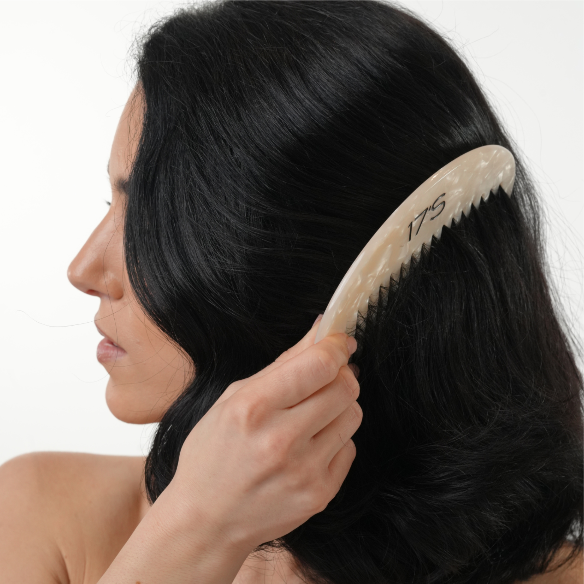 Using the 17's Haircare Vanilla Pearl Comb for smooth styling and a calming scalp massage